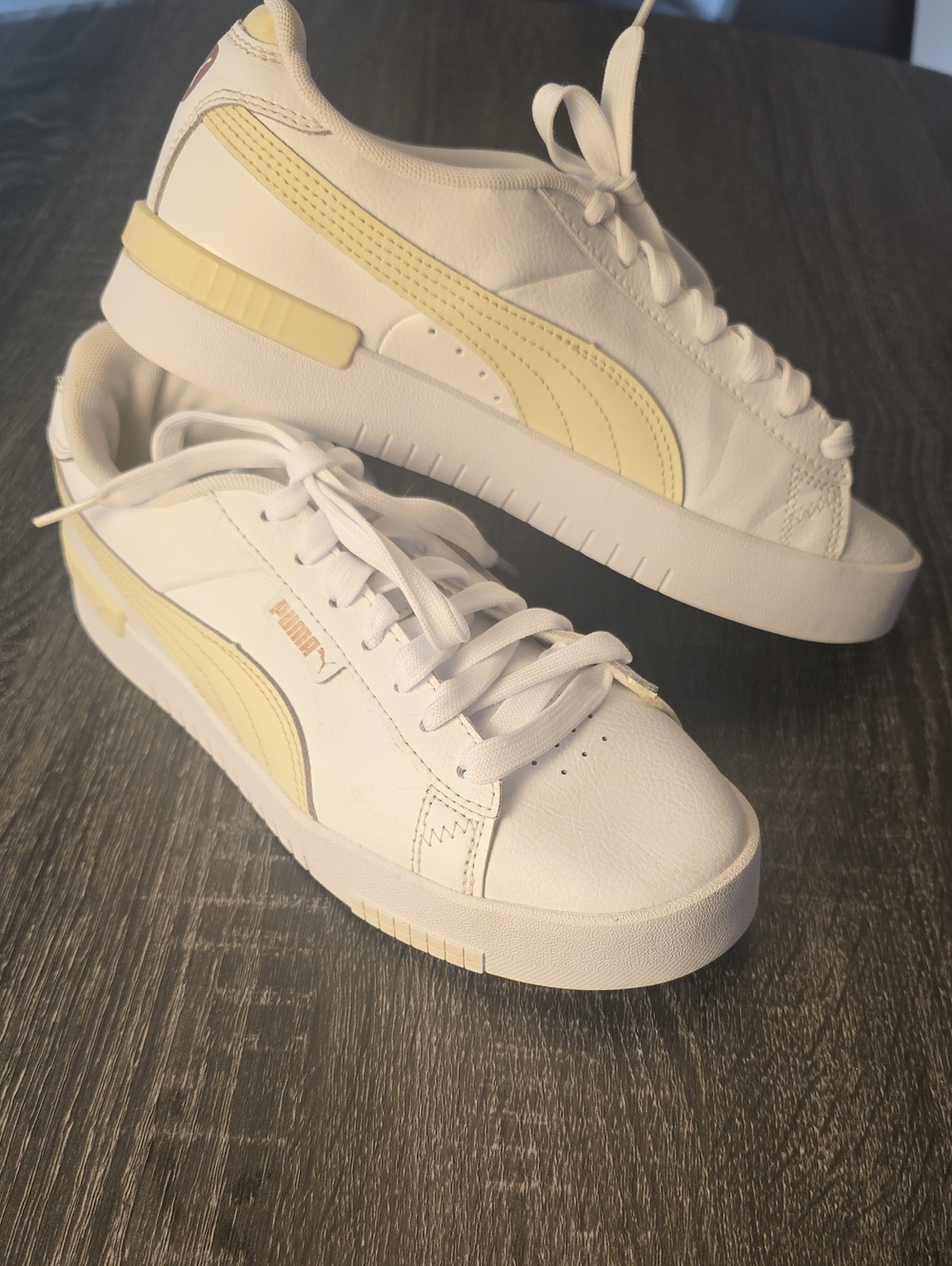 Puma Women's White Sneakers with Pale Yellow Accents